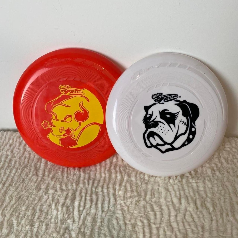 Two Wham-O Frisbees Yellow Devil and Bulldog Graphics Popular Fun